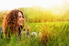 Pretty smiling girl relaxing outdoor